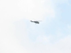 1080p: Military chopper flying over the glacier Stock Footage