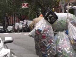 Man collecting tin cans, New York City, USA Stock Footage