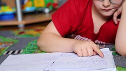 Little boy reading Stock Footage