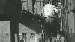 MONTAGE Steelworkers, riveters, and welders working power tools in shipyard / United Kingdom Stock Footage