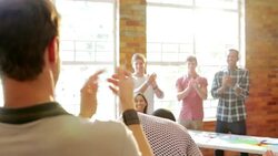 Audience clapping for bowing speaker with microphone Stock Footage
