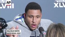 Seattle linebacker Malcolm Smith returned an interception of Peyton Manning 69 yards for a touchdown and later recovered a fumble, earning Super Bowl MVP honors in the Seahawks' 43-8 victory over the Denver Broncos on Sunday night. (Feb. 3) Instructional Video