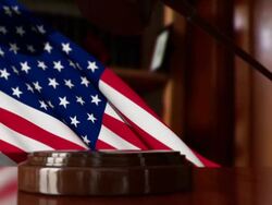 Judges's Gavel with USA Flag Stock Footage
