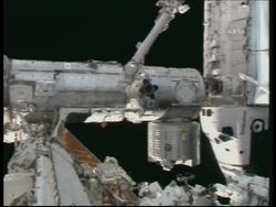 Astronauts carry out spacewalk to build Space Station robot News Clip