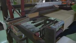 Weaving on loom Stock Footage