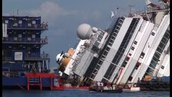 Italy - Shipwrecked Costa Concordia wrested off Italian reef / Engineers declare shipwrecked Concordia upright after 19-hour salvage operation / trial of captain of cruise ship that struck reef, killing 32 people / Five Costa Crociere employees guilty of manslaughter in shipwreck that killed 32 / Former Costa Concordia captain blames helmsman for botching manoeuvre he said would have avoided ship's collision with reef News Clip
