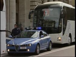 WRAP Man Utd fans arrive in Rome ahead of CL match, fears of violence ADDS security News Clip