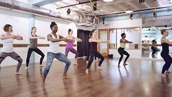 Women in exercise studio Stock Footage