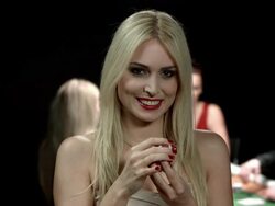 HD DOLLY: Exciting Woman Holding Gambling Coins Stock Footage