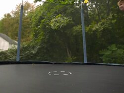 WS SLO MO shot of three Caucasian male children on trampoline, being bounced and falling down / Stanford, Connecticut, United States  Stock Footage
