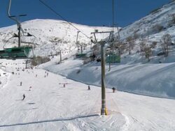 WS POV People skiing at ski resort during winter / Mount Hermon, Upper Galilee, Isarel Stock Footage