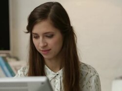Young female graphic designer drawing on monitor with digital pen tool Stock Footage