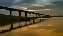 Rail bridge 'Pa Sak Jolasid Dam' on twilight time lapse Stock Footage