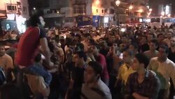 THOUSANDS OF PROTESTERS TEARING UP PICTURES OF PRESIDENTIAL CANDIDATES News Clip