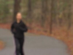 Pam Runs Past - Panning Stock Footage