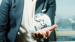 Businessman Holding Globe Stock Footage