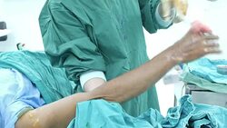 Scrub nurse clean patient Forearm Stock Footage