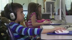 VOICED : In technology era US schools may scrap cu News Clip