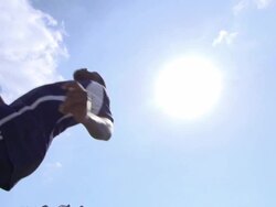 A man playing soccer on a grassy field. - Slow Motion - filmed at 240 fps Stock Footage