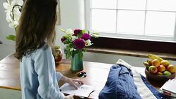 Woman looking through mail Stock Footage