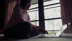 Businesswoman using on a laptop Stock Footage