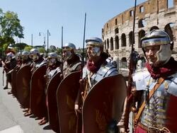 MS Shot of Costumes parade for the anniversary of the birth of Rome, also knowns as "Natale di Roma" People dressed as ancient romans and gladiators walks along the landmarks of the city / Rome, Italy  Stock Footage