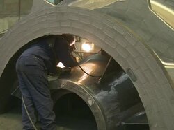  MS Polisher at cast piece at foundry / Juenkerath, Rhineland-Palatinate, Germany  Stock Footage