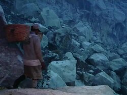 MS Men walking to the sulfur mining at night / Ijen, Java, Indonesia Stock Footage