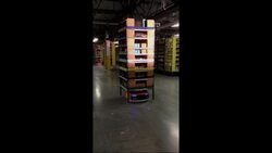 The e-commerce giant Amazon boasts that it has boosted efficiency by deploying more than 15,000 wheeled robots to crisscross the floors of its biggest warehouses and deliver stacks of toys, books and other products for processing. (Dec. 1) News Clip