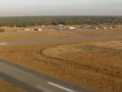 WS AERIAL View of Landing at Barnwell County Airport / South Carolina, United States Stock Footage
