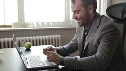 Happy Businessman Using Computer Stock Footage