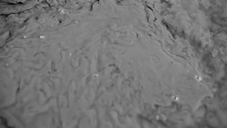 Puddle, mud, abstractions, black and white Stock Footage