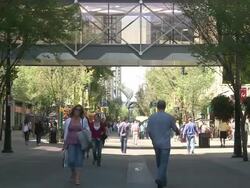 MS People walking on street  / Calgary, Alberta, Canada Stock Footage
