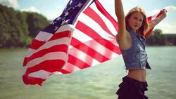 Girl waving the american flag. Stock Footage