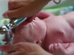 CU Shot of newborn baby getting bath / Lamy, New Mexico, United States Stock Footage