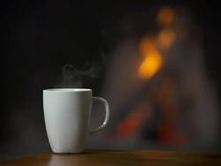 Hot Beverage In Front Of Fireplace SlowMotion Stock Footage