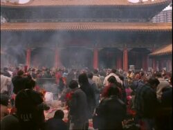 People praying inside the Wong Tai Sin Temple, Chinese new year, Wong Tai Sin Temple, Hong Kong Stock Footage