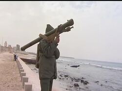 The Obama administration is being urged to stop the slaughter of Moammar Gadhafi's opponents in Libya, but though it's considering military options, many of them have a distinct downside. AP White House Correspondent Mark Smith reports. News Clip