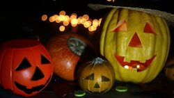 Halloween pumpkin head jack lantern on wooden background Stock Footage
