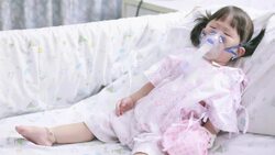Little sick girl with oxygen mask Stock Footage