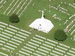 WS AERIAL ZO ZI View of Cemetery Passendale with farm land / Flanders, Belgium Stock Footage