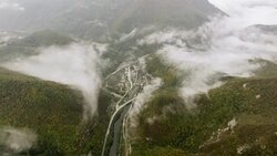 Aerial fligh over a mountain village Stock Footage