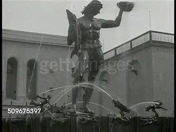 1943: SWEDEN: SCHOOL: WS City school. DENTAL CLINIC: LS Patients in row of dental chairs. Female dentist working on child's teeth. MS Child smiling. POWER: XWS Hydroelectric power plant & dam. WS Open dam locks w/ water flowing. Government sponsored Instructional Video