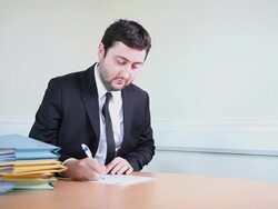 Turkish business man signing papers Stock Footage