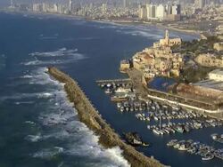 Aerial the old city of Jaffa and the skyline of Tel Aviv, Jaffa, Israel Stock Footage