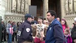 CLEAN : Anti fascist Femen member storms Notre News Clip