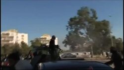 Fighting breaks out in Tripoli between revolutionaries and pro-Gadhafi forces News Clip