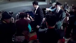 Hollywood couple arrive in limo and sign autographs for fans on awards show red carpet at awards show Stock Footage