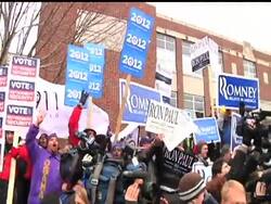 As New Hampshire residents headed to the voting booths Tuesday, many of the candidates were visiting polling places - some were swarmed as pushing and shoving erupted. News Clip