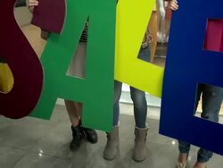 HD: Cheerful Women With Sale Sign Stock Footage